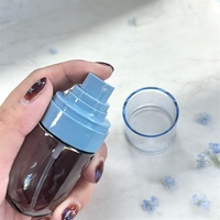 Botella Redonda Transparente de PETG al por Mayor con Tapa, Nuevo Estilo, Envase de Plástico Invertido para Cosméticos y Cuidado de la Piel, Pulverizador de Niebla Fina