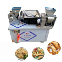 Petit ordinateur de bureau 	 Machine à découper la pâte à pierogi de bonne qualité 	 Machine à Rissois Machine à Samosa 	 Machine à empanadas