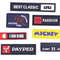 Écusson logo en caoutchouc de couture jeans personnalisé accessoire décoratif étiquettes en silicone PVC de marque pour vêtements