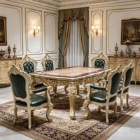 Ensemble de table à manger de luxe européenne avec plateau en marbre, chaises en bois massif sculptées à la main avec finition dorée et revêtement en cuir vert, vente en gros