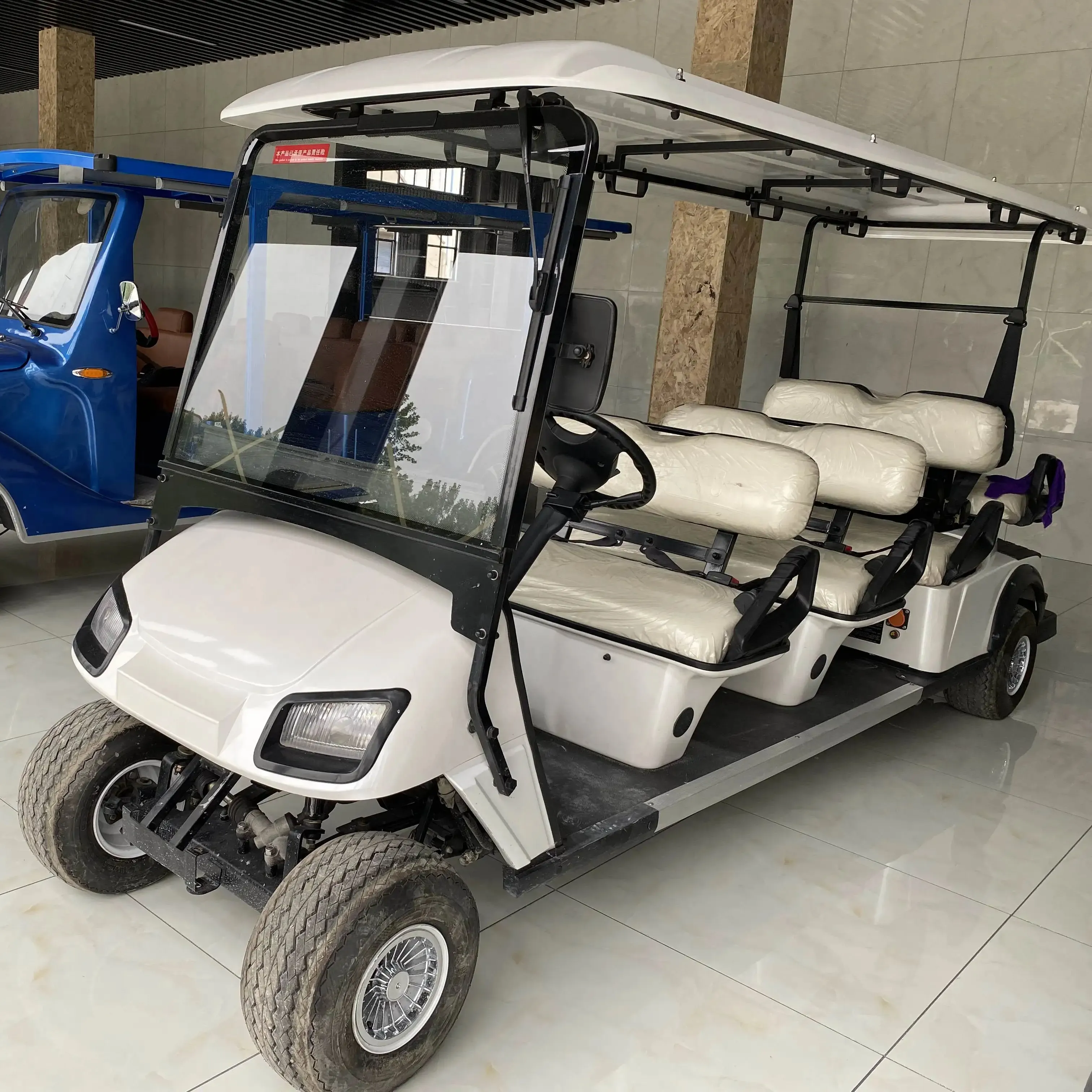 Chinesische Fabrik billig 4 plus 2 Passagier Resort Hotel Golf Buggy Roller 6 Sitz Golf Cart Auto in der Tür oder im Freien zu verkaufen