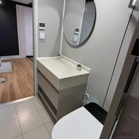 Vente en gros à distance Maison conteneur préfabriquée de luxe Mini maison mobile préfabriquée extensible avec 2 chambres pour immeuble de bureaux