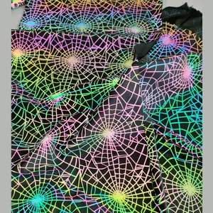 custom spiderweb pattern printed rainbow iridescent reflective polyester spandex cloth fabric for rave fashion stylish clothing