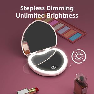 Miroir cosmétique de poche compact à double face en forme de cœur avec éclairage LED et grossissement 2X - Product Image 3