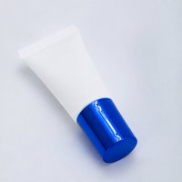 Tube cosmétique vide en PE de 25 mm avec bouchon à vis, impression de logo personnalisée, OEM pour l'emballage de crème pour le visage, lotion, soins de la peau