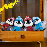 Peluche pingouin mignon en gros avec bonnet et écharpe tricotés, jouet en coton PP doux, poupée en peluche pour cadeau d'enfant et décoration intérieure