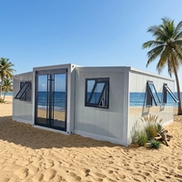 Maison conteneur préfabriquée extensible moderne et attrayante en acier, personnalisable, de 40 et 20 pieds, sur roues, pour usage bureautique ou hôtelier