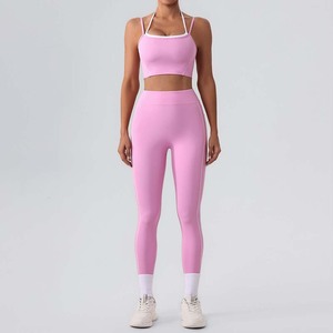 JY Ladies 2 pz Sport Gym abbigliamento sportivo Halther Crop <span class=keywords><strong>Top</strong></span> con imbottitura petto pieghevole vita alta lifting glutei e gonna Yoga set - Product Image 2