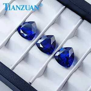 Искусственные рассыпчатые драгоценные камни синего сапфирового цвета с видимыми включениями