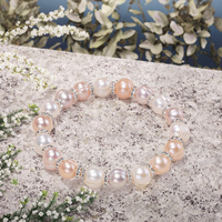 Bracelet extensible de perles d'eau douce avec perles intercalaires et strass