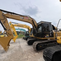 Excavatrice sur chenilles Caterpillar 315D2GC en bon état, fonctionnement flexible, idéale pour les projets de creusement de canalisations