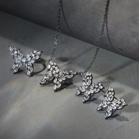 Ensemble de bijoux de luxe en argent pistolet plaqué noir plein diamant Zircon papillon boucles d'oreilles collier bague mariage Festival cadeau femmes