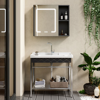 Ensemble de rangement pour balcon avec évier et meuble de salle de bain gris, planche à laver, vasque en céramique, pieds métalliques autoportants et étagère ouverte - Vente en gros