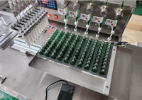 Machine de remplissage et d'emballage automatique 10 buses 3 ml 5 ml 10ml 20 ml 50ml 100ml d'huile essentielle de fumée d'huile de parfum de bouteille de parfum de tube
