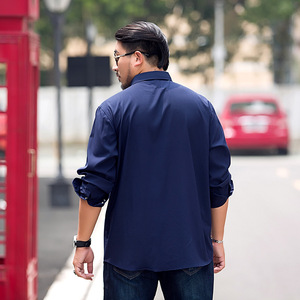 เสื้อเชิ้ตลำลองทรงหลวมสำหรับผู้ชายไซส์ใหญ่ แขนยาว สีพื้น สำหรับใส่ทำงาน - Product Image 5