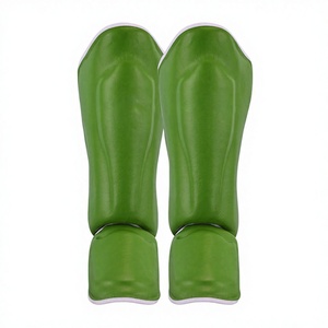 Protège-tibias en cuir durable avec rembourrage antichoc, design léger et écologique pour la boxe – Confort optimal et ajustement parfait - Product Image 1