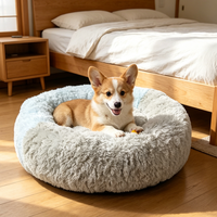 Coussin apaisant pour animaux de compagnie, forme ronde en forme de beignet, doux et chaud, en fausse fourrure, pour chien et chat, lavable, avec logo personnalisé, directement de l'usine