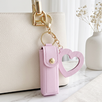 Étui à rouge à lèvres portable en cuir PU avec miroir compact en forme de cœur et porte-clés