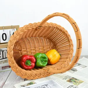 Hot Oval Hand Pp Rattan Woven Fruit Storage Basket Cheap Home Decorative Picnic Outdoor Gifts Storage Basket With Handle