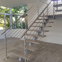 Escalier droit moderne et minimaliste en acier inoxydable pour villa, design durable à monopoutre