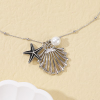 Collar de acero inoxidable Ocean Series con cadena de eslabones de moda de perla de concha de estrella de mar de cristal de playa para compromiso