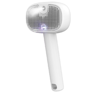 Pet <strong>Accessories</strong> 3-in-1 Self-Cleaning USB Rechargeable <strong>Electric</strong> Vapor Comb Steamer Water Tank Release Button Cat Dog Shedding