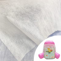 Tissu non tissé hydrophile perforé respirant à surface gaufrée pour couches pour bébés et serviettes hygiéniques