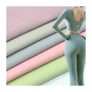China 75% Nylon 25% spandex peach skin interlock fabric for sport leggings  manufacturers and suppliers