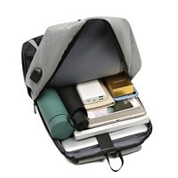 Sac à bandoulière en jean respirant de style nouveau transfrontalier avec chargement USB, bretelles à coussin d'air, sac d'ordinateur professionnel multifonction pour homme