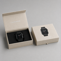 Boîte cadeau rigide magnétique en forme de livre avec surface mate douce au toucher, insert en mousse EVA personnalisé avec logo pour l'emballage de montres intelligentes et d'appareils photo