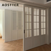 Puerta Plegable de Aluminio Estilo Francés Blanca AOSTTER con Vidrio Templado Transparente y Riel Empotrado para una Elegante Casa de Campo