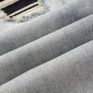 سروال جينز عالي الجودة من الدنيم للرجال موضة خريف 2024 للبيع بالجملة سروال كاجوال بتصميم ذي جيوب مطبوعة من Selvedge