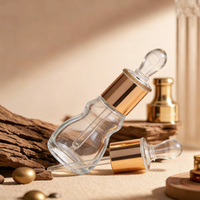 Vente en gros de flacons compte-gouttes en verre transparent personnalisables de 6 ml et 12 ml, en forme de gourde, pour huiles essentielles, avec bouchons compte-gouttes à col doré