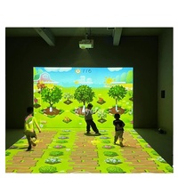 Projecteur interactif en forme de L de divertissement de graffiti numérique d'intérieur Jeux vidéo de projection interactifs de mur/sol pour des enfants