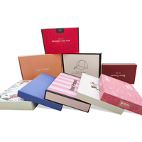 Boîte d'expédition rigide en carton ondulé, matériaux recyclés, laminage mat personnalisé, vente en gros, boîte d'emballage pour vêtements et sous-vêtements, noir et blanc