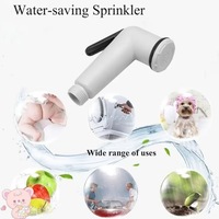 Pulvérisateur manuel et ensemble de douche à main mural en ABS à prix abordable pour bidet Shattaf, idéal pour les équipements sanitaires de salle de bain