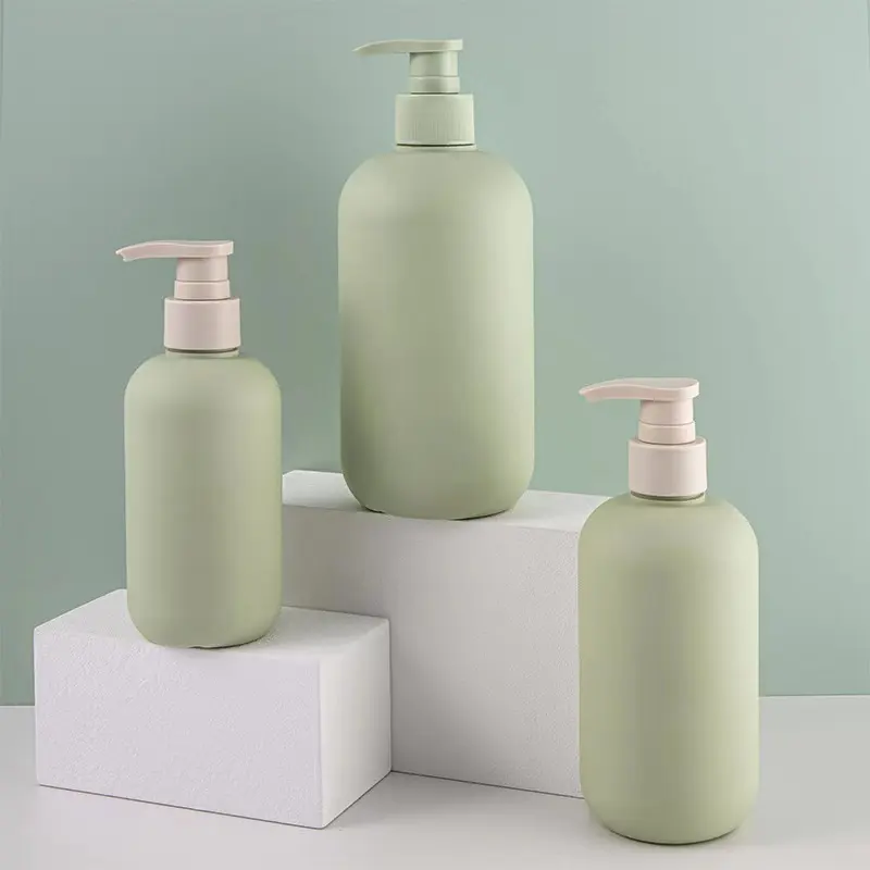 Bouteille de luxe en plastique PE de 500ml, bouteille de Lotion de couleur verte personnalisée, bouteille de pompe de Lotion pour le corps, bouteilles en plastique de désinfectant pour les mains