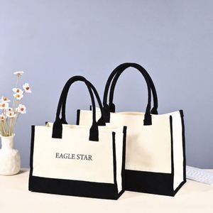 Sac de shopping en toile imperméable robuste avec logo personnalisable, design contrasté noir et blanc, patchwork écologique, sac fourre-tout en toile - Product Image 1