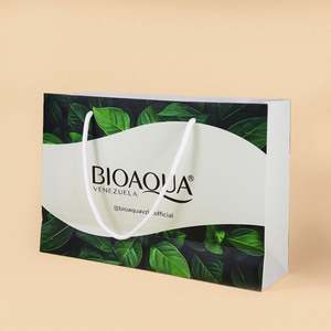 Custom Printed Logo Luxury Clothing Shop Packaging Cardboard Natural Style Paper Bag With Ribbon <b>Rope</b> - Product Image 1