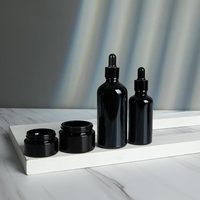 Bouchon à vis rond en verre de luxe en gros flacon compte-gouttes d'huile essentielle de sérum de parfum avec compte-gouttes noir