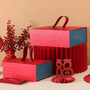 Luxury red paper cardboard gift box packaging with handle for Chinese lunar new year