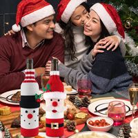 Housse de bouteille de vin tricotée de Noël, motif Père Noël, Bonhomme de neige, Renne, pull pour bouteille de vin, décoration de table de Noël, sac cadeau pour fête de fin d'année