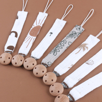 Vente en gros de chaîne de sucette pour bébé multicolore en pur coton avec logo personnalisé de sécurité avec clip en bois