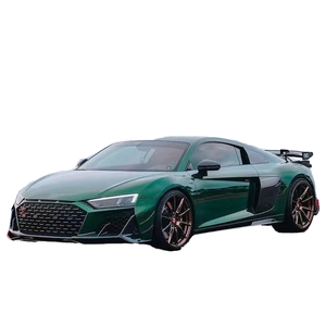 ชุดแต่งคาร์บอนไฟเบอร์สไตล์ Capristo สำหรับอัพเกรด Audi R8 ประกอบด้วยลิ้นกันชนหน้าแบบใหม่ ดิฟฟิวเซอร์ สปอยเลอร์ สเกิร์ตข้าง และกันชนรถยนต์ - Product Image 1
