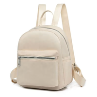 Sac à dos personnalisé mini imperméable GPS antivol avec fermeture éclair pour un usage décontracté unisexe, en nylon noir