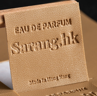 Rouleau d'étiquettes d'emballage avec logo personnalisé papier synthétique PVC vinyle imperméable en cuir autocollant adhésif