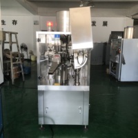 Machine de remplissage et de scellage entièrement automatique pour tubes souples, idéale pour l'emballage de crèmes cosmétiques, lotions et pâtes alimentaires