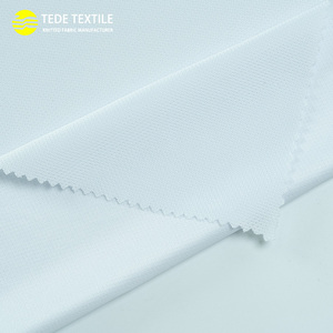100% <span class=keywords><strong>Polyester</strong></span> 145gsm 183Cm Chống-Tĩnh Trắng Pinhole Lưới Vải Dệt Kim Thăng Hoa Thể Thao Cho Cô Gái Bóng Đá T-Shirts - Product Image 1