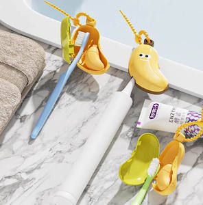 Vente en gros : Housse mignonne en forme de banane, protège-tête portable anti-poussière pour voyage, organisateur de salle de bain - Product Image 1