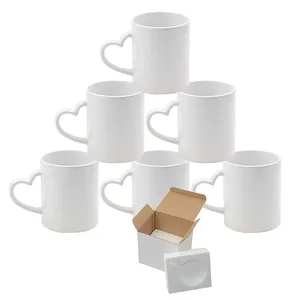 Tasses en céramique unies avec poignée en forme de cœur avec revêtement par sublimation Tasse à café en céramique blanche de 11oz avec poignée en forme de cœur